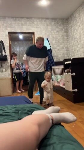 Family spending evening together at home in Vesyoloye, Russia