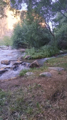 Turbulent river flows through rocky Akhmatabad landscape