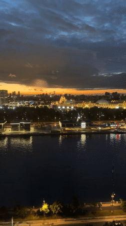 Moscow cityscape captured from elevated position showing colorful evening sky