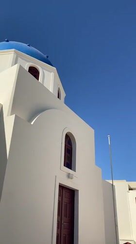 Morning in Oia: blue domes, sea views, and Santorini aesthetics