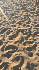 Beach volleyball played on sunny day in Barcelona