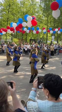Women perform military-style dance for crowd in Krasnogorsk