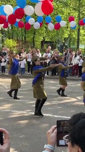Women perform military-style dance for crowd in Krasnogorsk