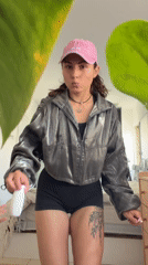 Woman documents morning workout routine in Kiryat Bialik bedroom