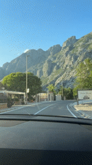 Driver travels winding road past Stari Mlini in Dobrota