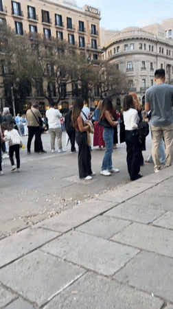 Evening crowds gather in Barcelona's cathedral square