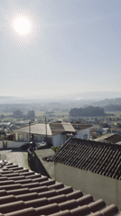Aerial view captures Portuguese rural landscape with terracotta roofs