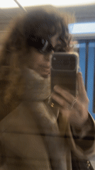 Person Takes Selfie in Moscow Elevator