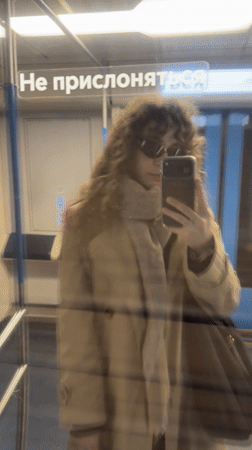Person Takes Selfie in Moscow Elevator