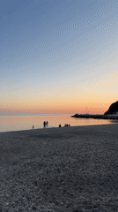 Sunset gathering documented at Russian beach resort town
