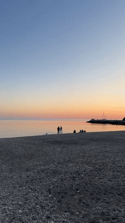 Sunset gathering documented at Russian beach resort town