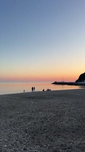 Sunset gathering documented at Russian beach resort town