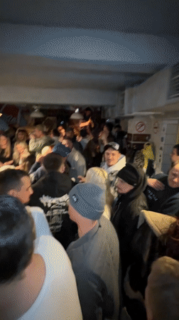 Crowded bar scene captured in Sheregesh, Russia