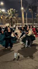 Women perform traditional dance with drums in Arica plaza