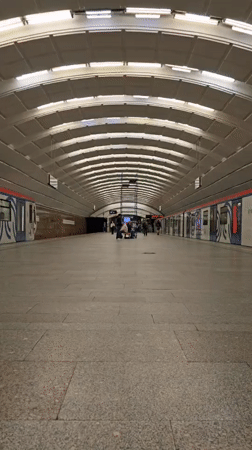 Moscow Metro trains operate at Smolenskaya station during afternoon hours