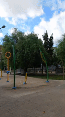 Barcelona neighborhood park and street life, September afternoon