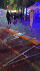 Police surround prone person in Buenos Aires nightlife district