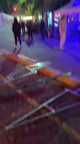 Police surround prone person in Buenos Aires nightlife district