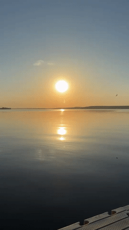 Afternoon waterfront life documented in Votkinsk, Russia
