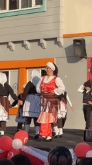 Children perform traditional folk dances for April 23rd celebration