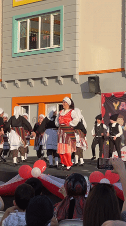 Children perform traditional folk dances for April 23rd celebration