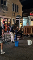 Late-night street band plays jazz on a Provincetown sidewalk