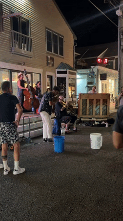 Late-night street band plays jazz on a Provincetown sidewalk