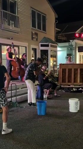 Late-night street band plays jazz on a Provincetown sidewalk
