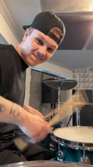 Drummer records music in Russian studio