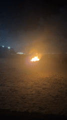 Beach bonfire draws small gathering in North Kuta