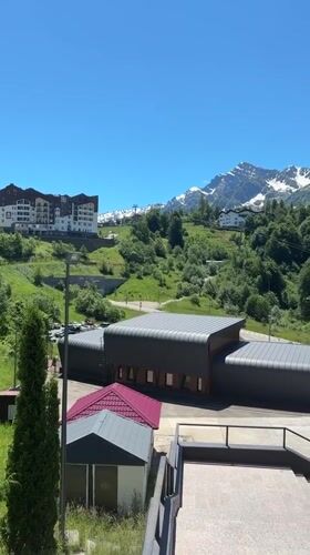 Sunny morning around Estosadok's mountain resort streets and buildings