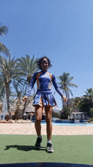 Woman performs poolside activities, dances in Porlamar Venezuela