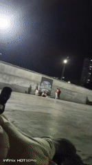 Late-night gathering on a Caracas basketball court