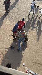 Daily street commerce and minor accident documented in Bukuru