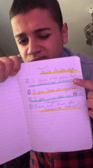 Young man displays handwritten daily task list in Bulgaria
