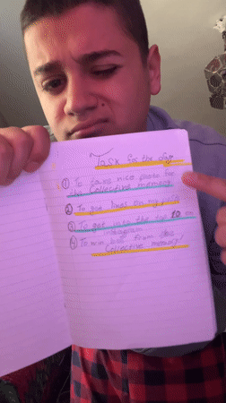 Young man displays handwritten daily task list in Bulgaria