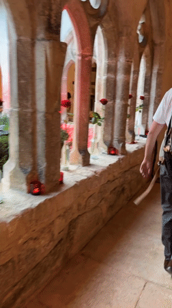 Red-lit evening event at a Swiss monastery cloister