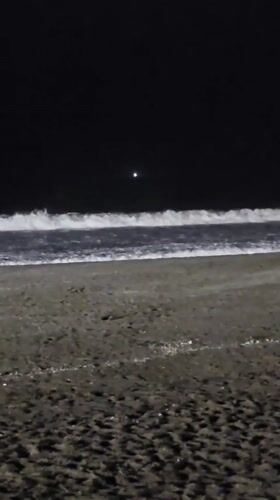 Nighttime scenes captured in Iquique showing 2027 countdown clock