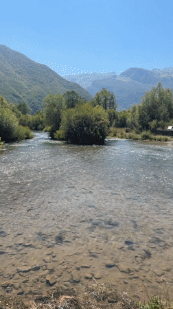 A summer morning exploring Gusinje's rivers, fields, and mountain scenery