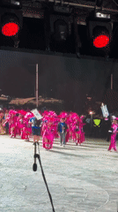 Pink-costumed carnival performers stage musical show in Budva, Montenegro