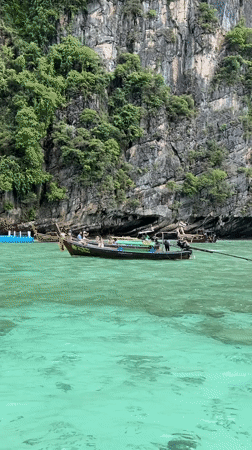 Boat tour and swimming stop among Ao Nang's limestone karsts