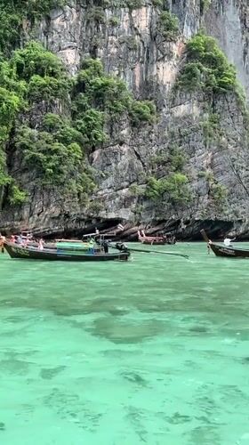 Boat tour and swimming stop among Ao Nang's limestone karsts