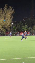 Nighttime soccer match observed on artificial turf in Tbilisi