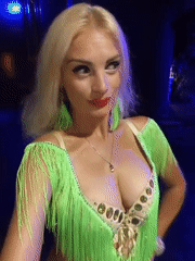 Belly dance performance in vibrant green costume, Kuşadası