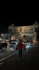 Illuminated ornate building captured on video in Rome nighttime