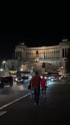 Illuminated ornate building captured on video in Rome nighttime