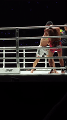 Boxing match concludes with victory celebration in Bangkok ring
