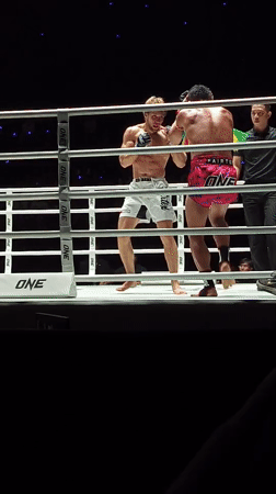 Boxing match concludes with victory celebration in Bangkok ring