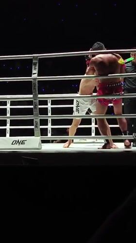Boxing match concludes with victory celebration in Bangkok ring