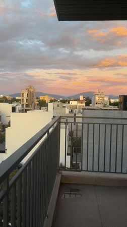 Đà Nẵng skyline glows under a layered sunset sky